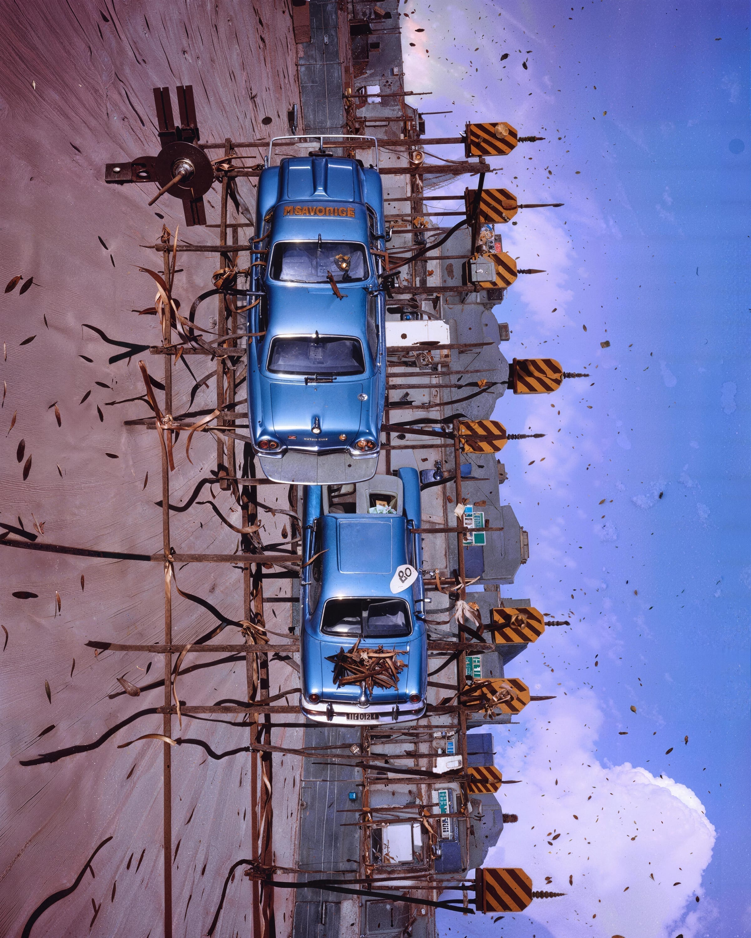 The Two Blue Cars